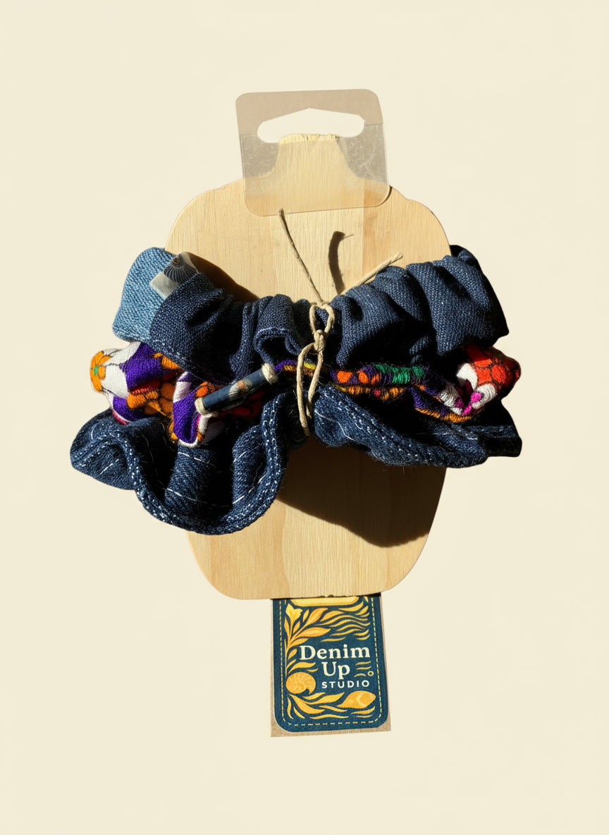 Denim and vintage scrunchie set on a wooden surface, next to a denim label with bead